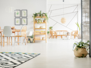 A room with many plants and furniture in it