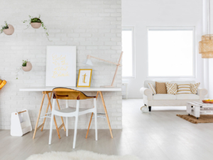 A white room with a table and chairs