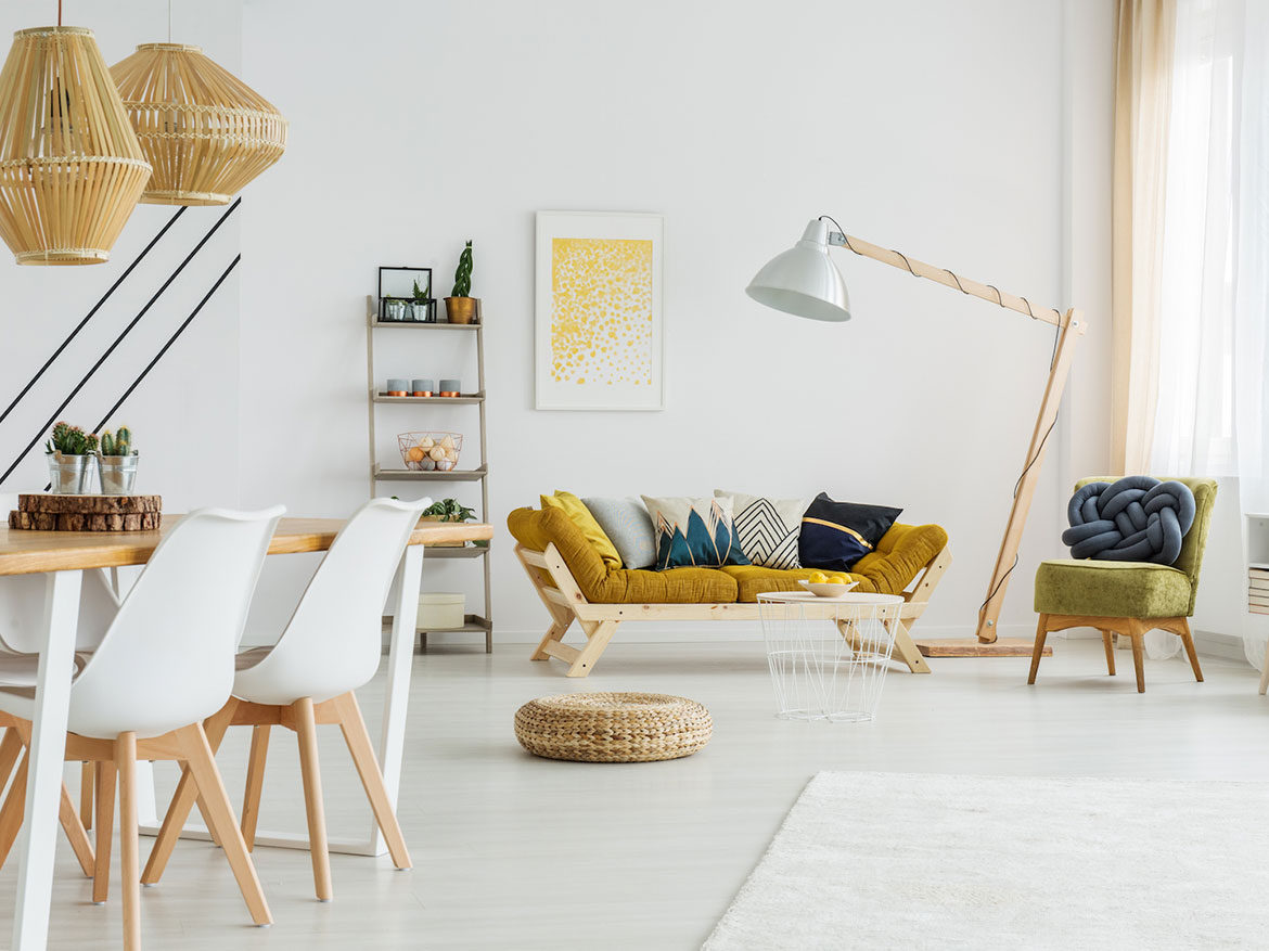 A living room with white walls and furniture.