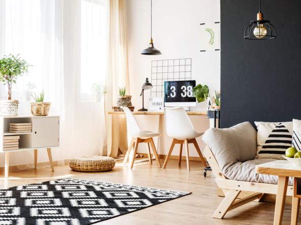 A living room with a couch, chair and table.