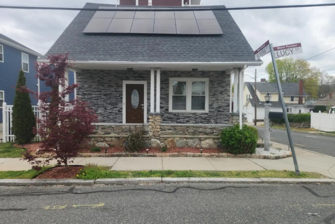 A house with solar panels on the roof.